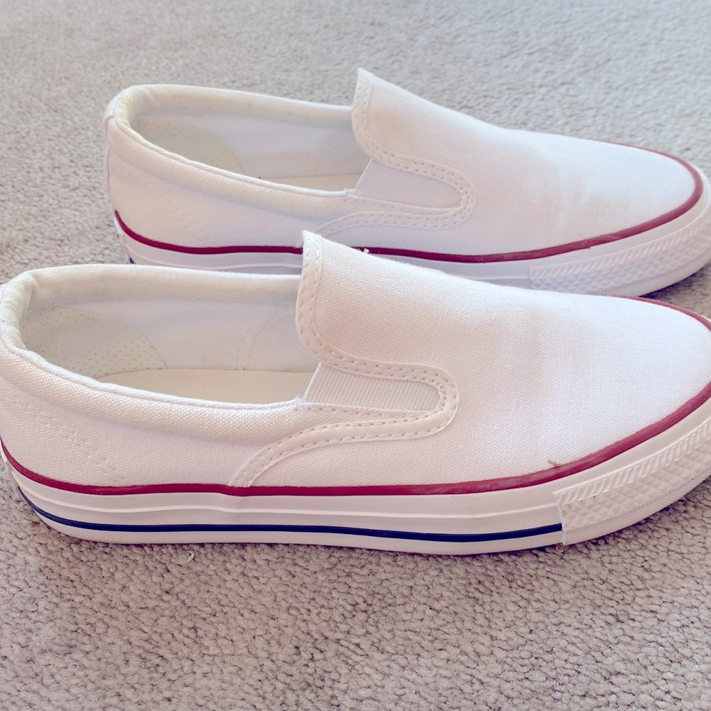 Worn twice converse all-star slip on. Love them but too small. Size 5.5 womens.